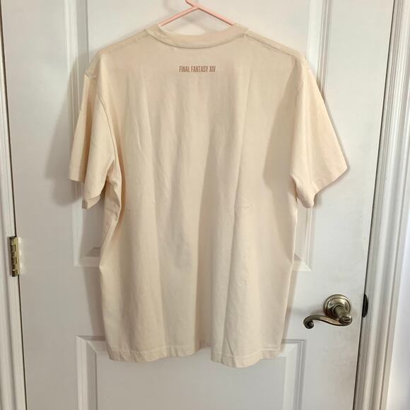Uniqlo Final Fantasy 14 FFXIV Chocobo Moogle Fat Cat Pocket T-shirt in Natural - Picture 8 of 12